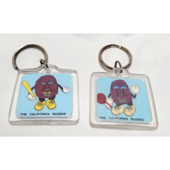 Lot of 2 The California Raisins Keychains Retro Cartoon Characters Plastic Metal - Picture 1 of 6